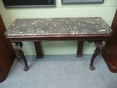 Lot 524 - An Early Victorian Carved Mahogany Hall Table, mid 19th century, the bardiglio marble top with...