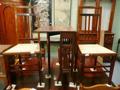 Lot 532 - Edwardian Sutherland table and two bedroom chairs