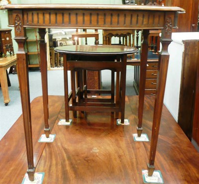 Lot 543 - Reproduction occasional table on reeded legs