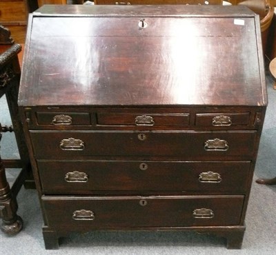 Lot 549 - Oak bureau (18th century and later)