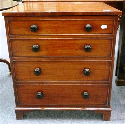 Lot 552 - A 19th century mahogany commode