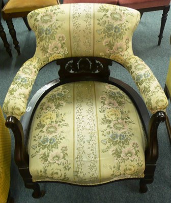 Lot 565 - An early 20th century upholstered open armchair