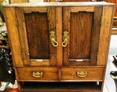 Lot 578 - Oak hanging cabinet