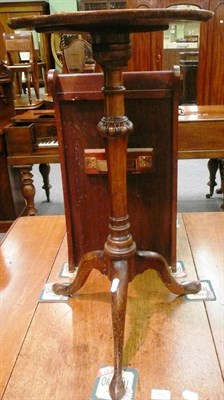 Lot 581 - A walnut occasional table, the burr veneered dished top raised on a turned pillar with fluted...