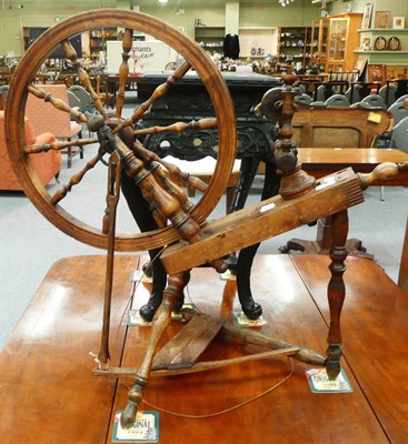 Lot 586 - A spinning wheel