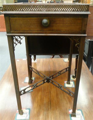 Lot 596 - A late 19th century George III style mahogany urn stand