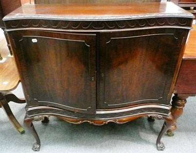 Lot 597 - George III style mahogany cabinet