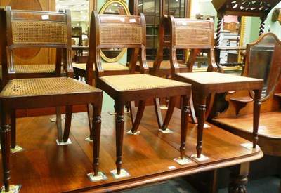 Lot 599 - A composite set of six George IV chairs with caned seats and backs