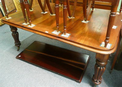 Lot 601 - 19th century mahogany dining table on carved legs