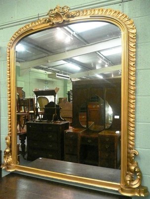 Lot 612 - A large Victorian carved gilt framed over mantel wall mirror