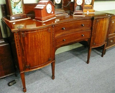 Lot 639 - 20th century mahogany sideboard with carved decoration