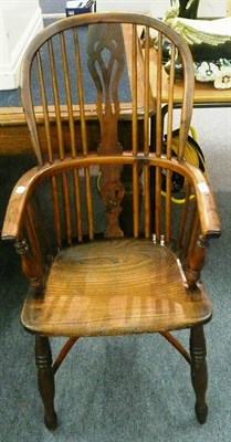 Lot 648 - 19th century yew and elm Windsor armchair on crinoline stretcher