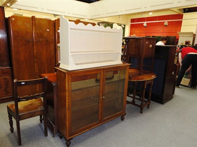 Lot 685 - An early 20th century glazed bookcase, a drop leaf table, a tripod table, a wall rack etc