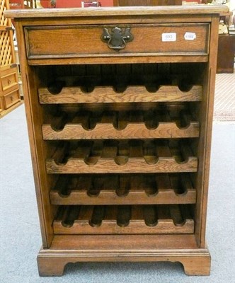 Lot 693 - A reproduction oak wine rack