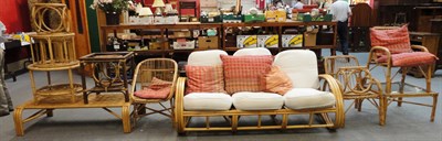 Lot 728 - Caned furniture comprising of sofa, three armchairs with cushions, low coffee table, six...