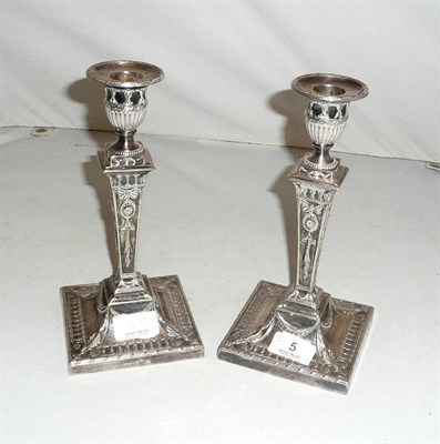 Lot 5 - A pair of silver plate candlesticks