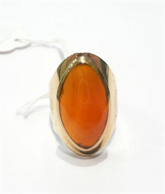 Lot 54 - An amber coloured ring