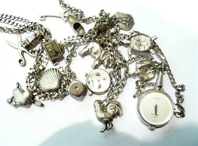 Lot 83 - A silver charm necklace and a watch on a chain
