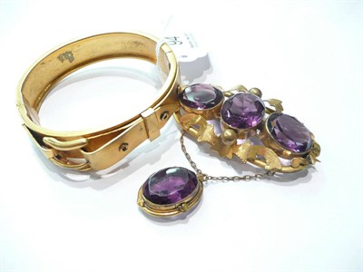 Lot 94 - A Victorian buckle bangle and amethyst brooch with pendant section
