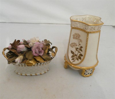 Lot 109 - A spill vase (restored rim), ceramic flowers in small bowl (restored handles) (2)