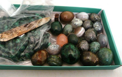 Lot 111 - A collection of malachite and agate eggs and malachite beads