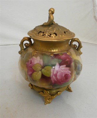 Lot 112 - A Royal Worcester pot pourri jar and cover of a lobed compressed globular form painted with...