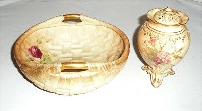 Lot 154 - A Royal Worcester basket shaped bowl decorated with pink and yellow roses and a pot pourri vase and