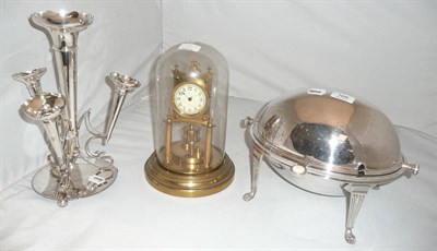 Lot 166 - A silver plate three section epergne, plated breakfast dish, and brass mounted 400 day clock