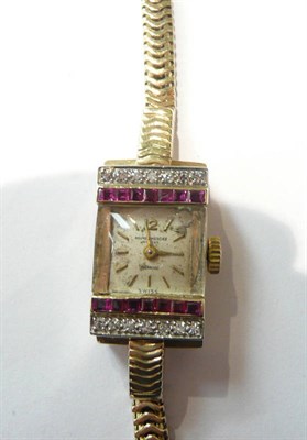 Lot 196 - A lady's 9ct gold 1940s Baume & Mercier ruby and diamond set wristwatch