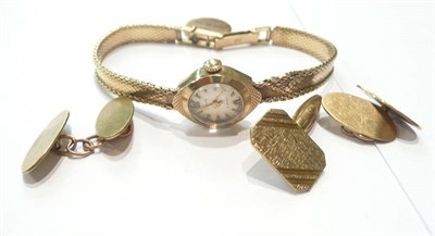 Lot 198 - A lady's 9ct gold wristwatch, pair of 9ct gold cufflink's and one other 9ct gold cufflink