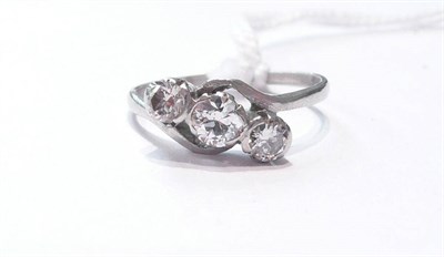 Lot 217 - A diamond three stone twist ring