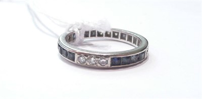 Lot 218 - Sapphire and diamond full eternity ring