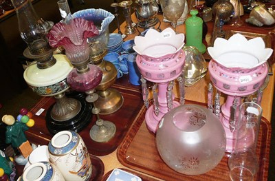 Lot 245 - Reproduction pink glass lustres, four oil lamps