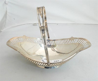 Lot 247 - A silver basket with swing handle