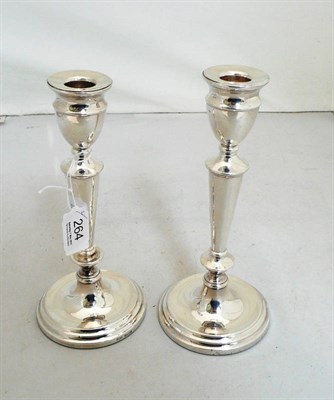 Lot 264 - A pair of loaded candlesticks 1970