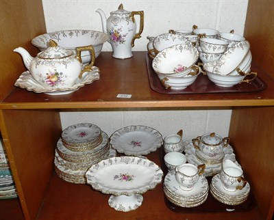 Lot 272 - Royal Crown Derby 'Vine' pattern dinner, tea and coffee service on two shelves