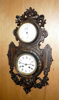 Lot 273 - A cast metal wall clock/barometer