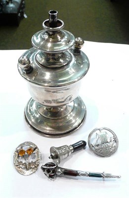 Lot 290 - Silver table lighter and three Celtic brooches