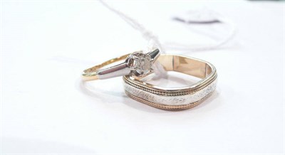 Lot 305 - A diamond solitaire ring and a 9ct gold band ring