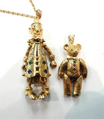 Lot 313 - Two 9ct gold pendants of a clown and a teddy bear