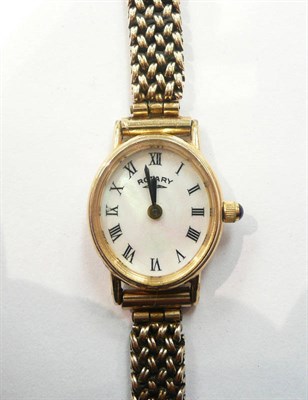 Lot 326 - 9ct gold rotary wristwatch with a mother of pearl style face