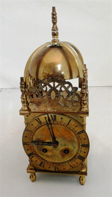 Lot 335 - A brass lantern clock