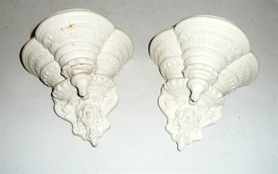 Lot 341 - A pair of Parian wall brackets