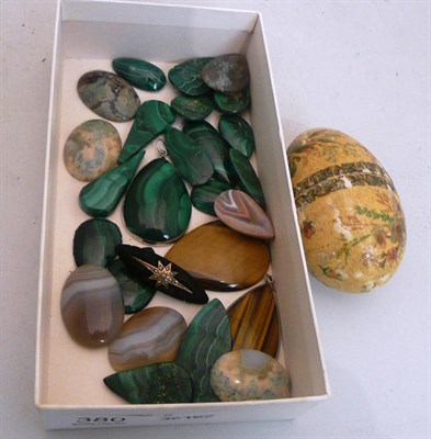 Lot 380 - Malachite pendants, pendant mounts and a wooden egg with transfer prints etc