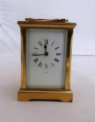 Lot 386 - A brass carriage clock retailed by A Fattorini, Harrogate