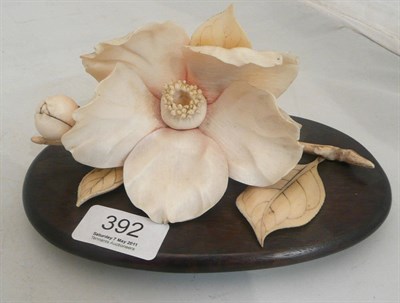 Lot 392 - A Chinese carved ivory model of a flower