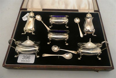 Lot 396 - A cased silver cruet set