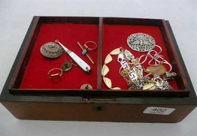 Lot 402 - A jewellery box containing two 9ct gold rings, a gold bar brooch, costume jewellery etc