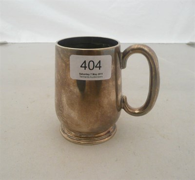 Lot 404 - A silver Christening mug