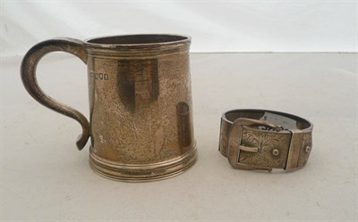 Lot 406 - A silver christening mug and a silver bangle